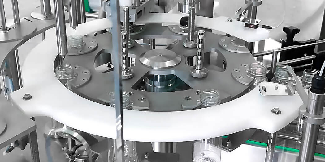 Bottle Filling Monobloc BFCM system for mango juice, showcasing the integrated filling and capping processes for efficient juice packaging operations.