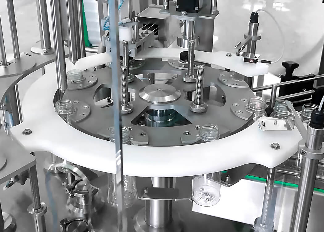 Bottle Filling Monobloc for Mango Juice Production in Gambia Bottle Filling Monobloc BFCM system for mango juice, showcasing the integrated filling and capping processes for efficient juice packaging operations.