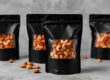 A variety of nuts packaged in resealable Doypack pouches, highlighting airtight sealing and high-barrier materials for freshness and extended shelf life.